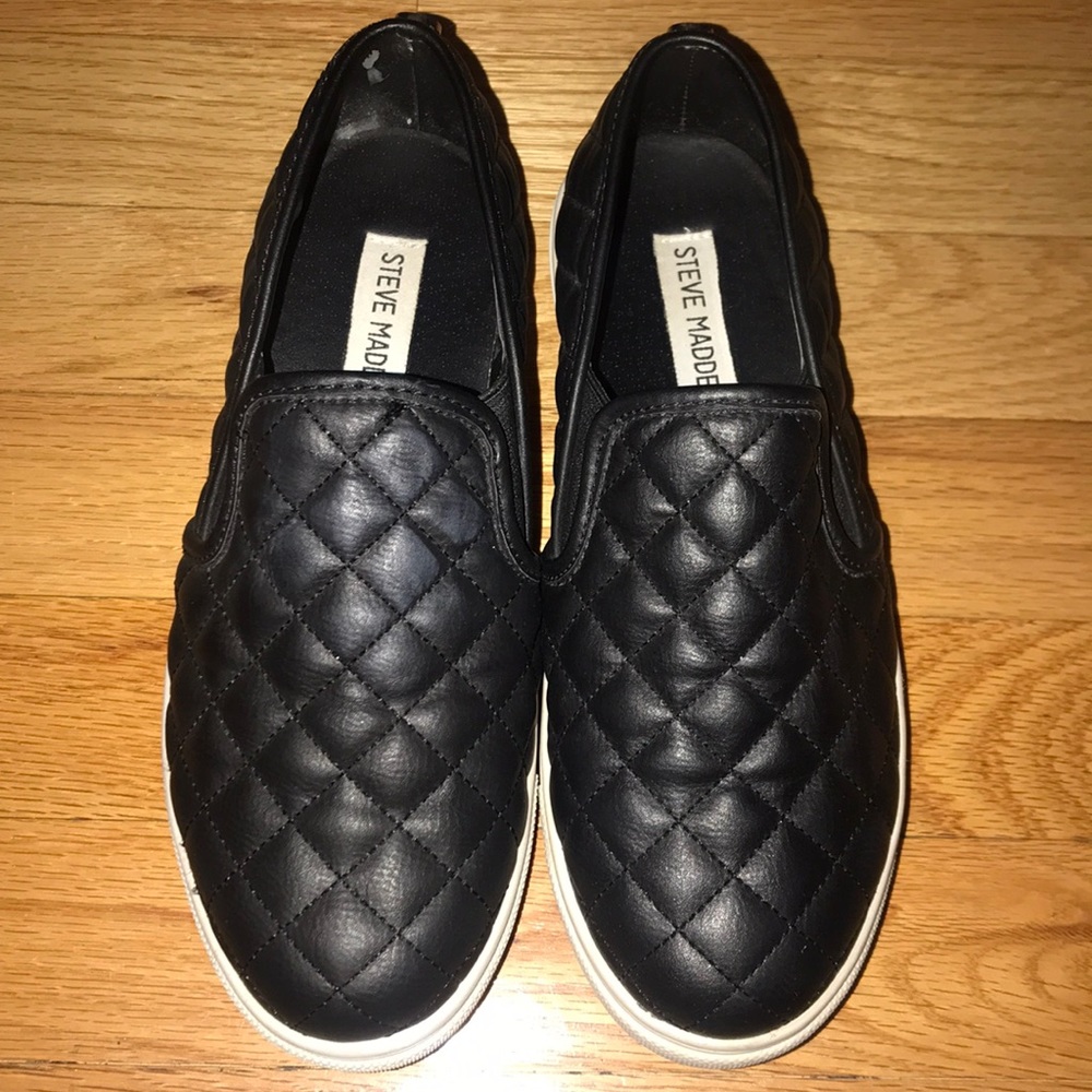 Steve Madden black leather slip ons